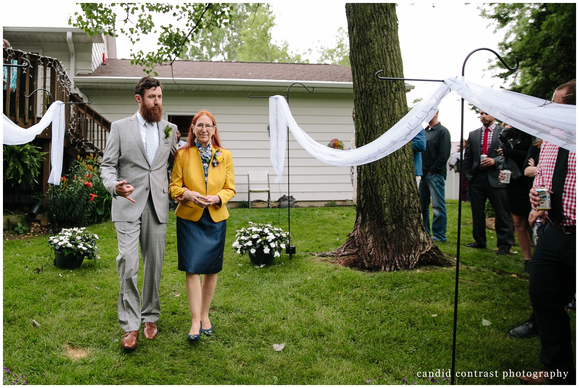 candid moments at backyard wedding in dubuque, ia, candid contrast photography