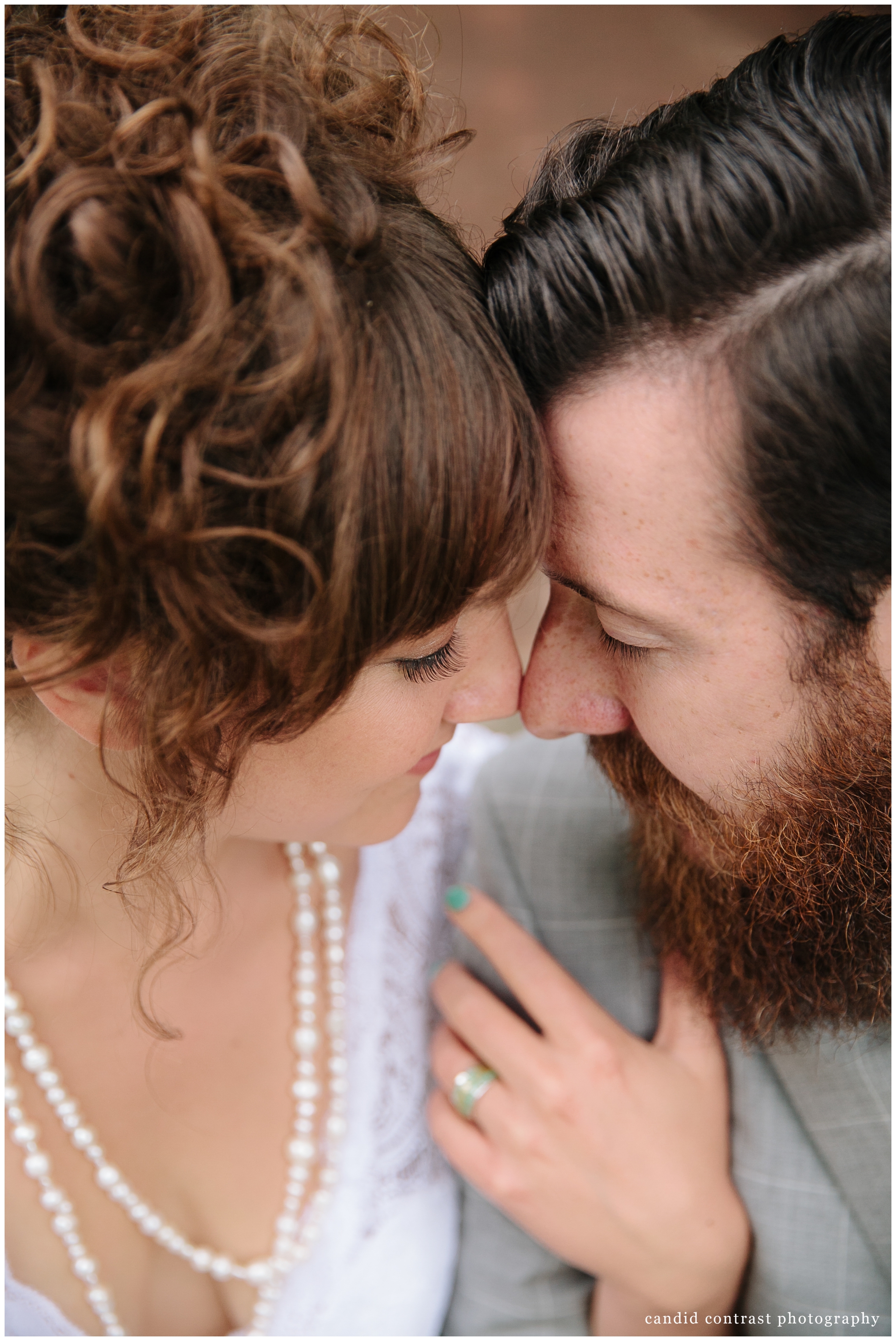 modern bride and groom portraits at backyard wedding in dubuque, ia, candid contrast photography