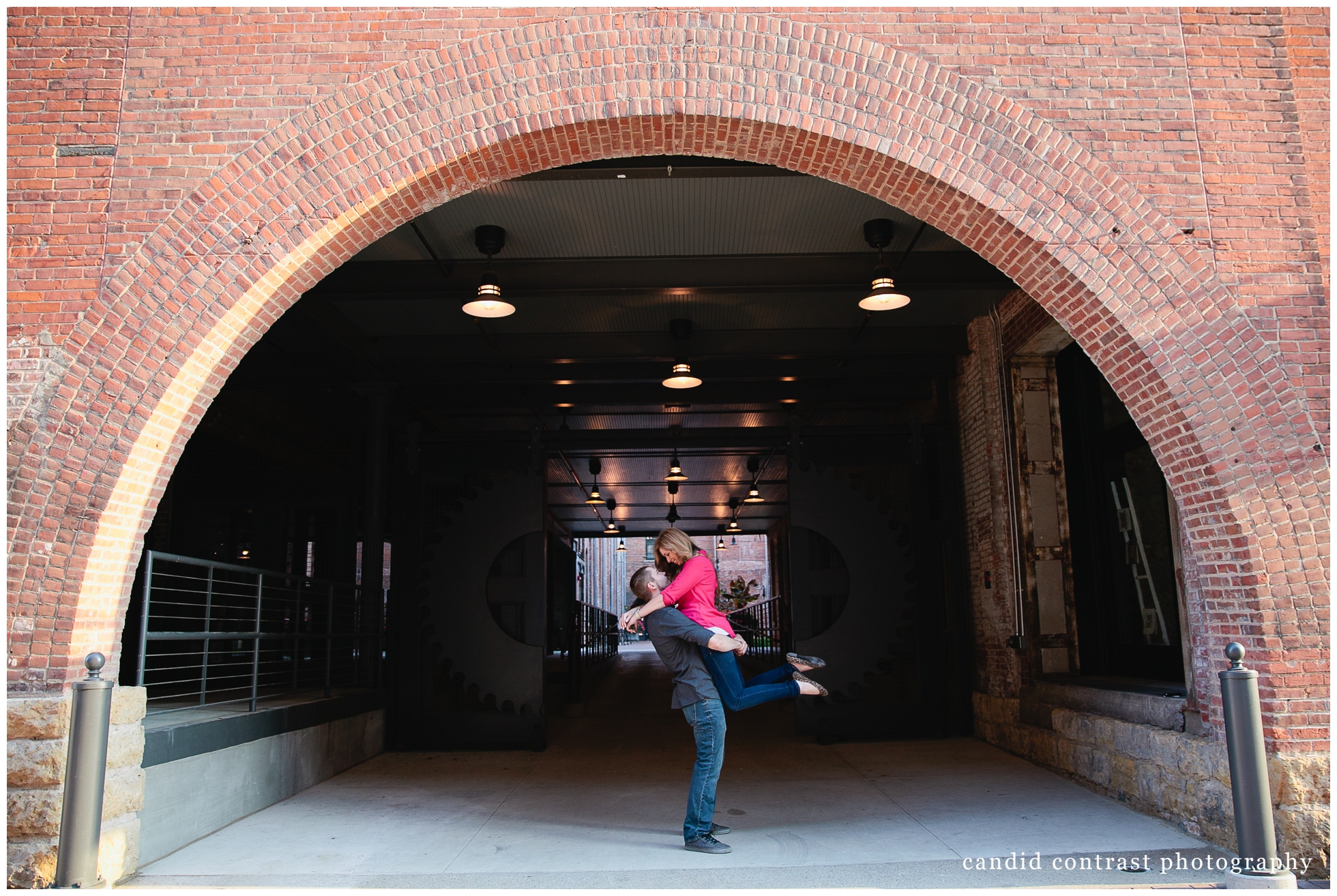 modern engagement photos in the millwork district in dubuque, ia, wedding photographer candid contrast photography