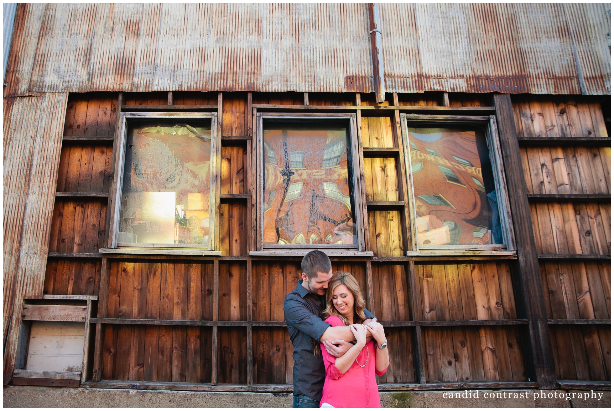 modern engagement photos in the millwork district in dubuque, ia, wedding photographer candid contrast photography