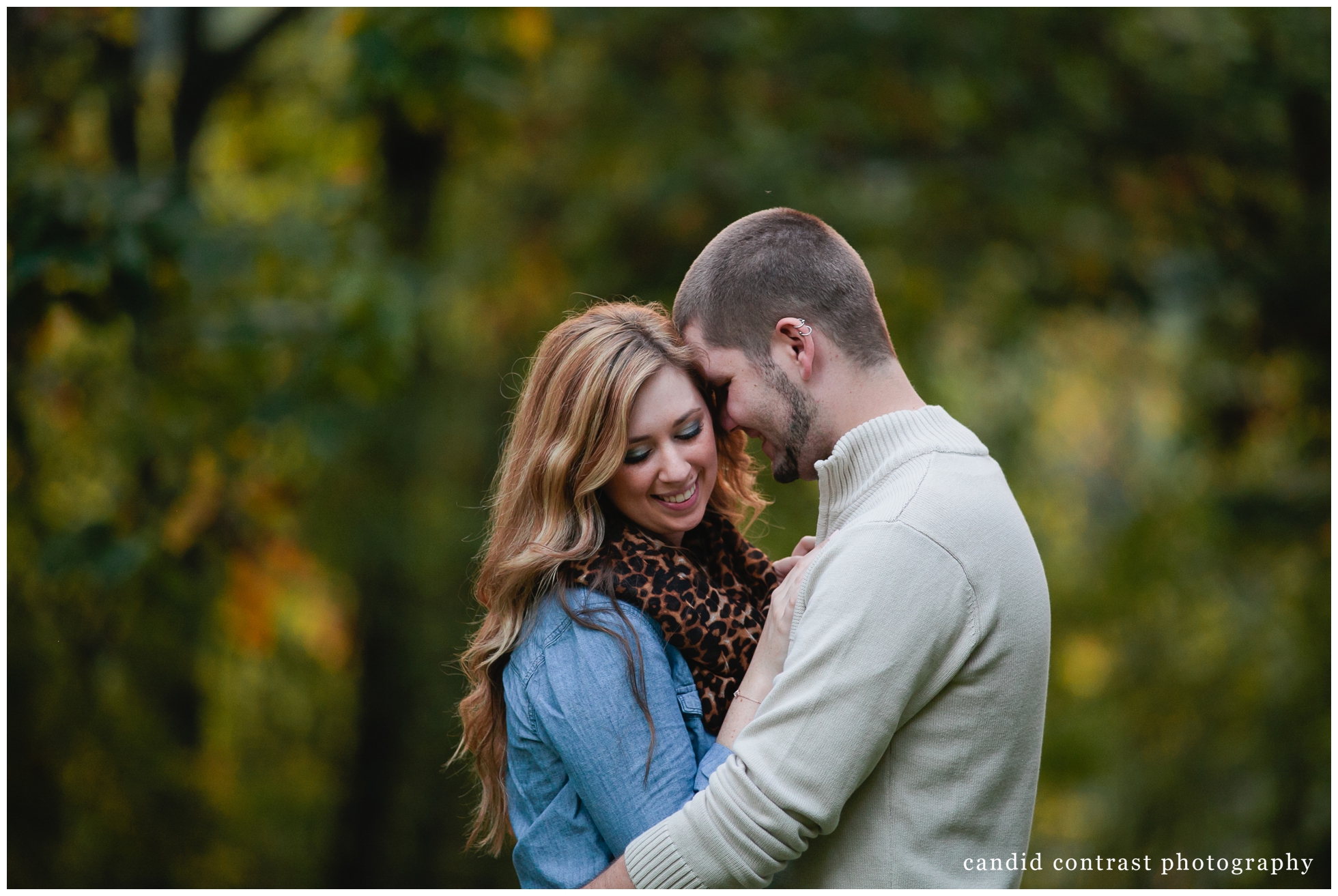 modern engagement photos in eagle point park in dubuque, ia, wedding photographer candid contrast photography