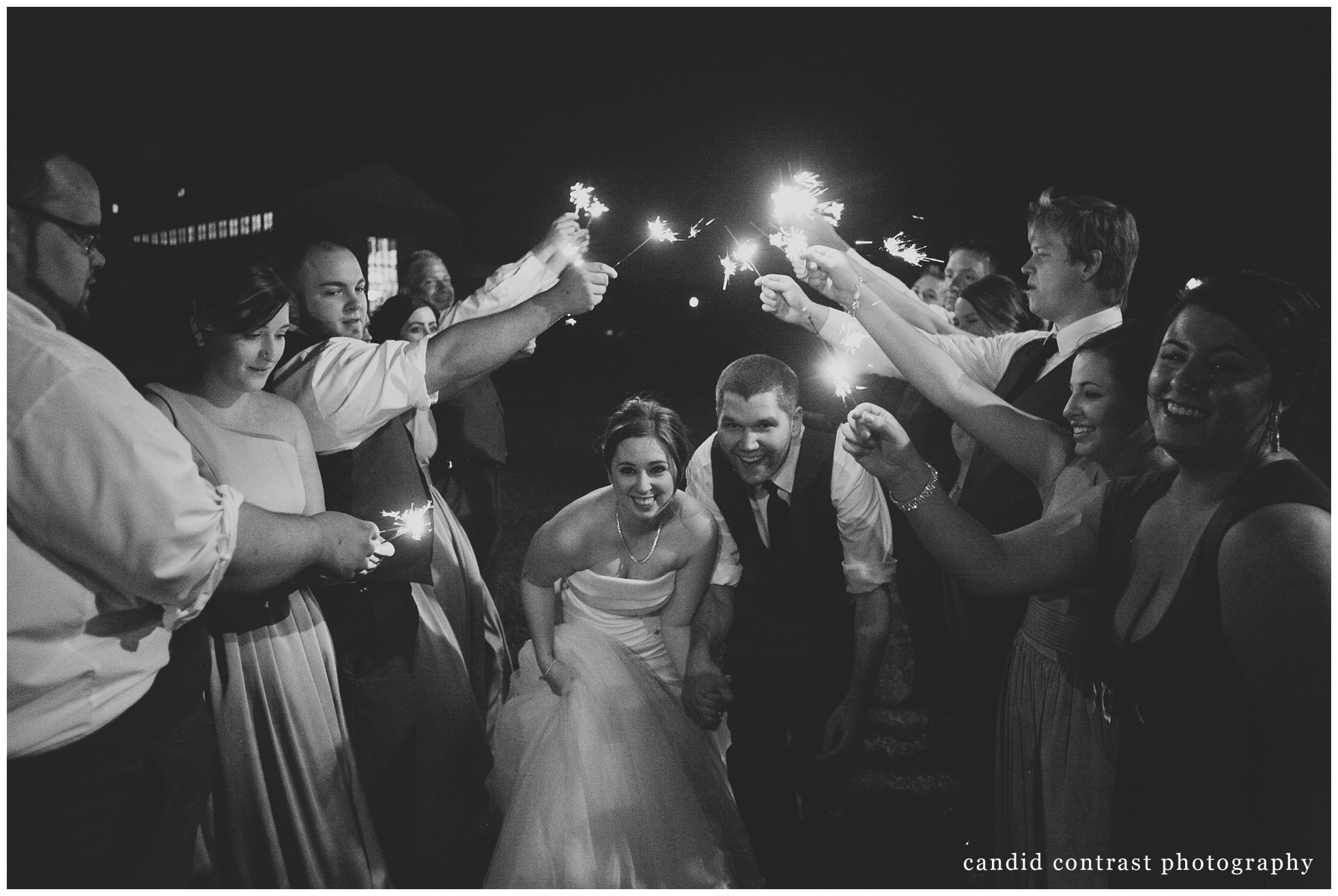 wedding reception sparkler exit at diamond jo casino at dubuque, ia wedding, candid contrast photography