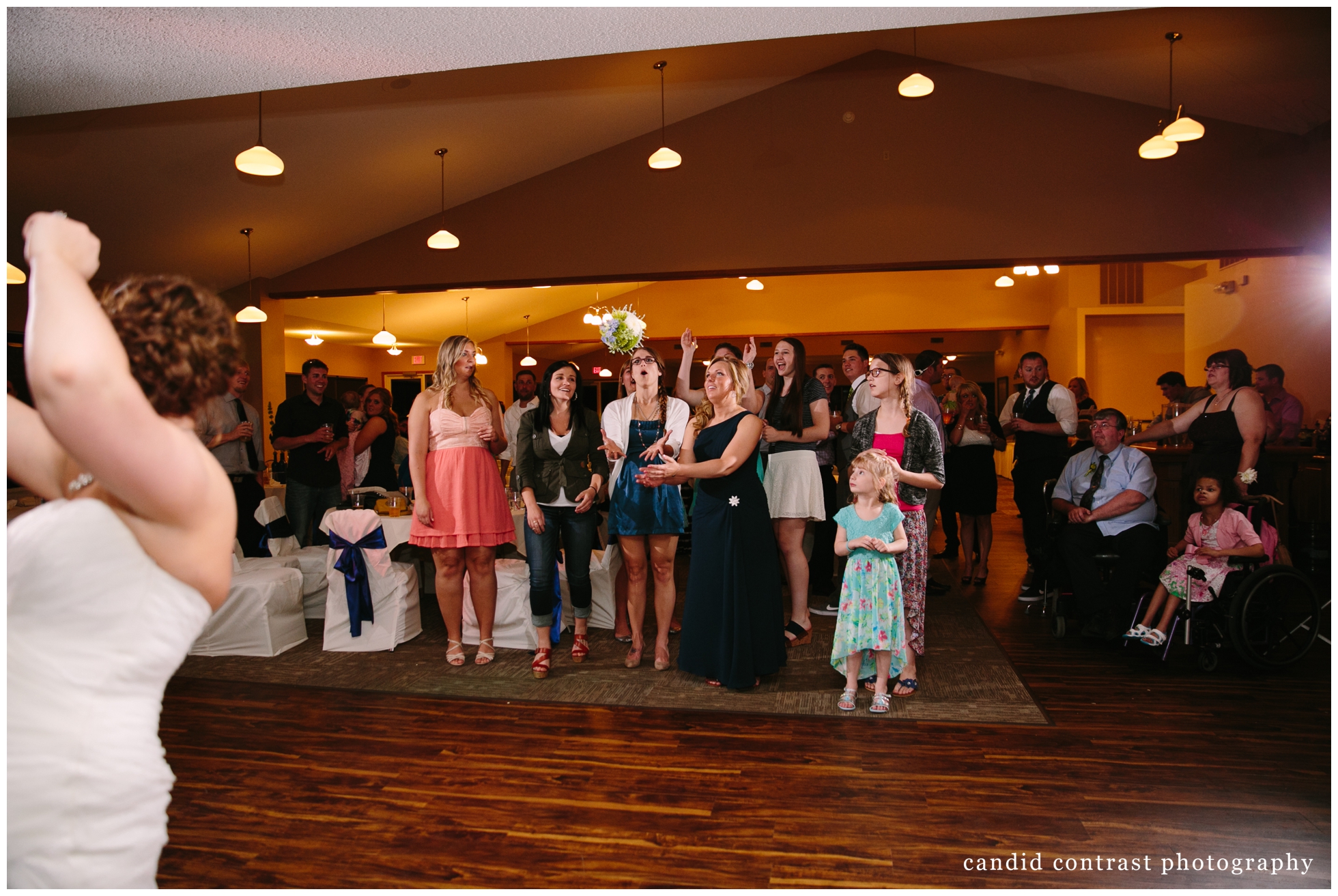 wedding reception at the Meadows Golf Club, Dubuque iowa wedding, candid contrast photography