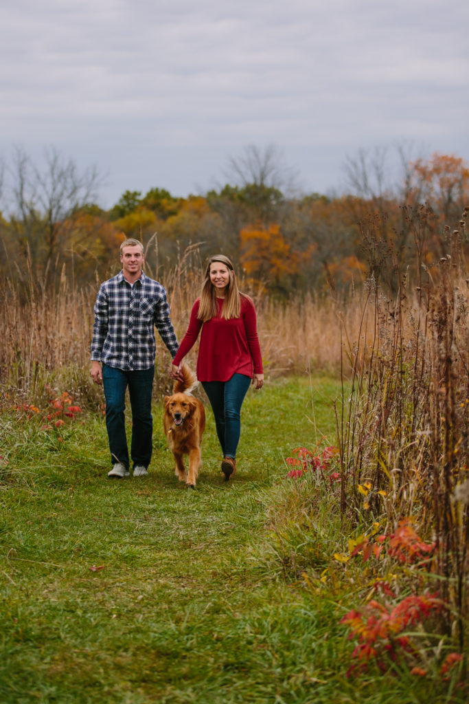 fall engagement photos with golden retreiver at mines of spain in dubuque