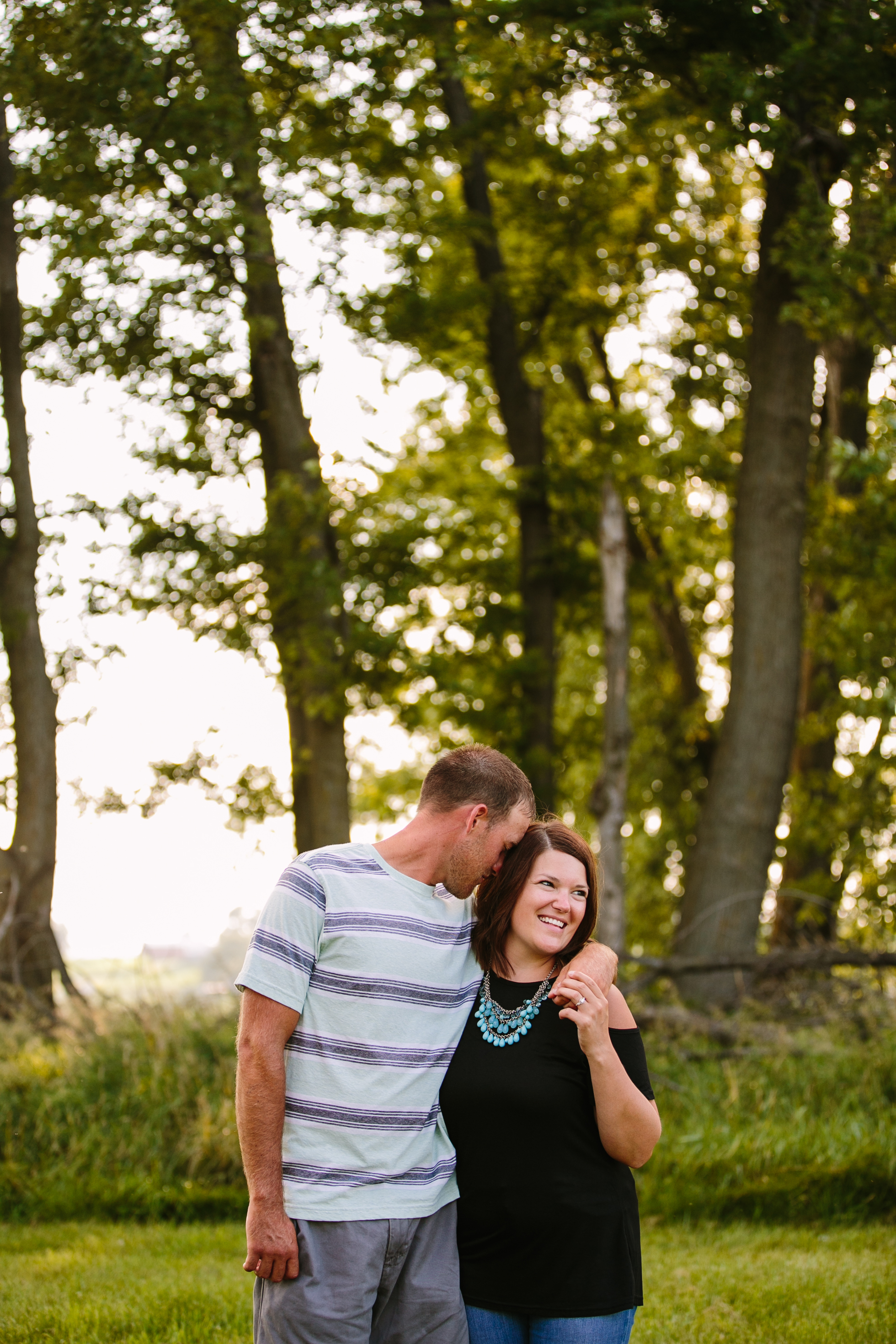 outdoor dubuque engagement session by catherine furlin photography, couple walking together