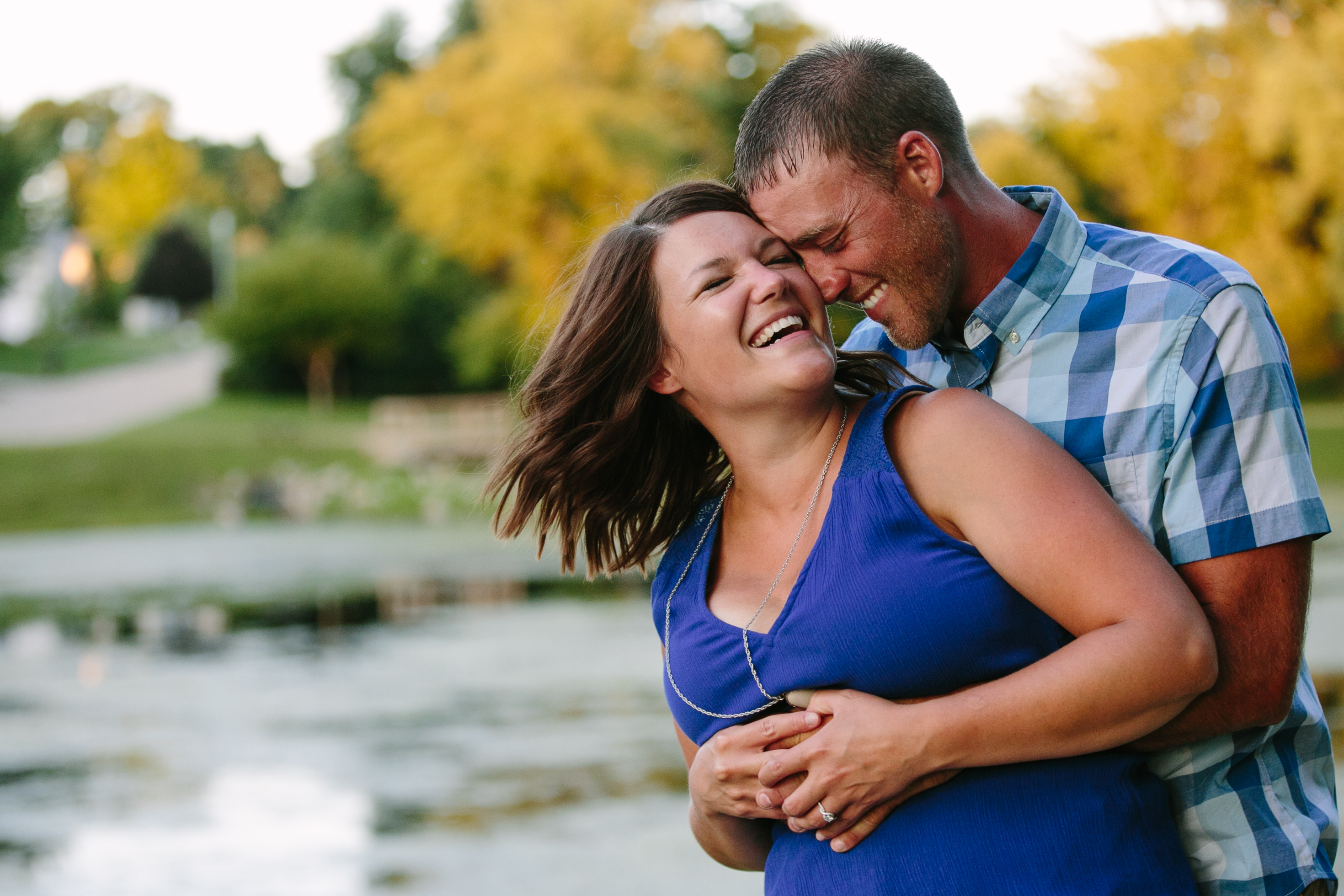 outdoor dubuque engagement session by catherine furlin photography, couple having fun