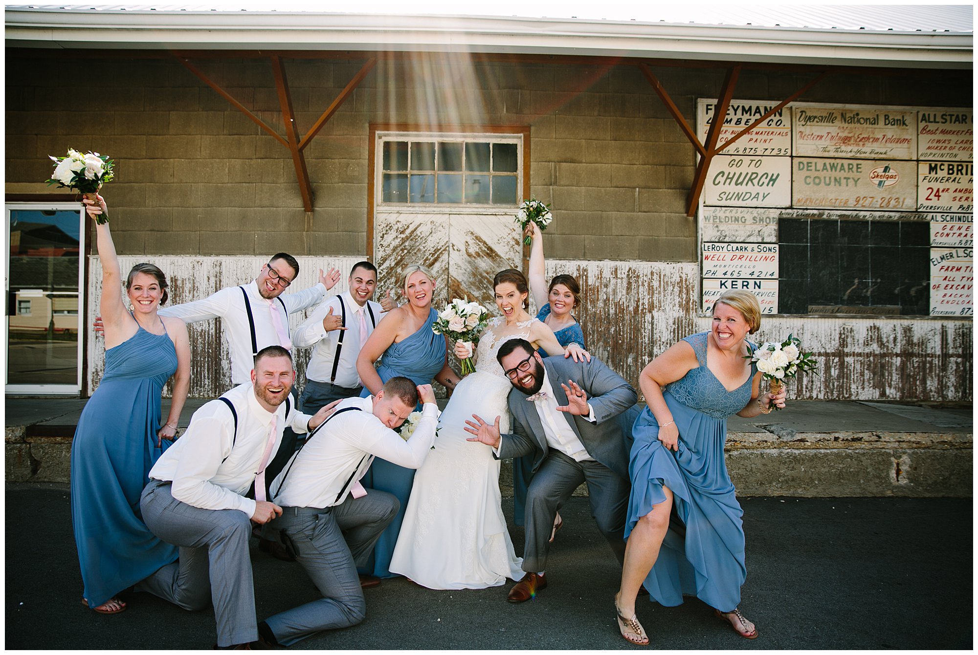 blue and gray wedding party in dyersville iowa