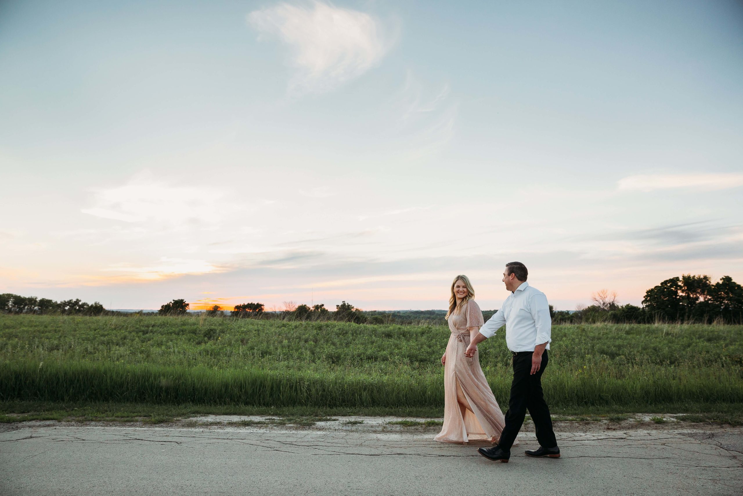 couple walking together during mines of spain engagement session