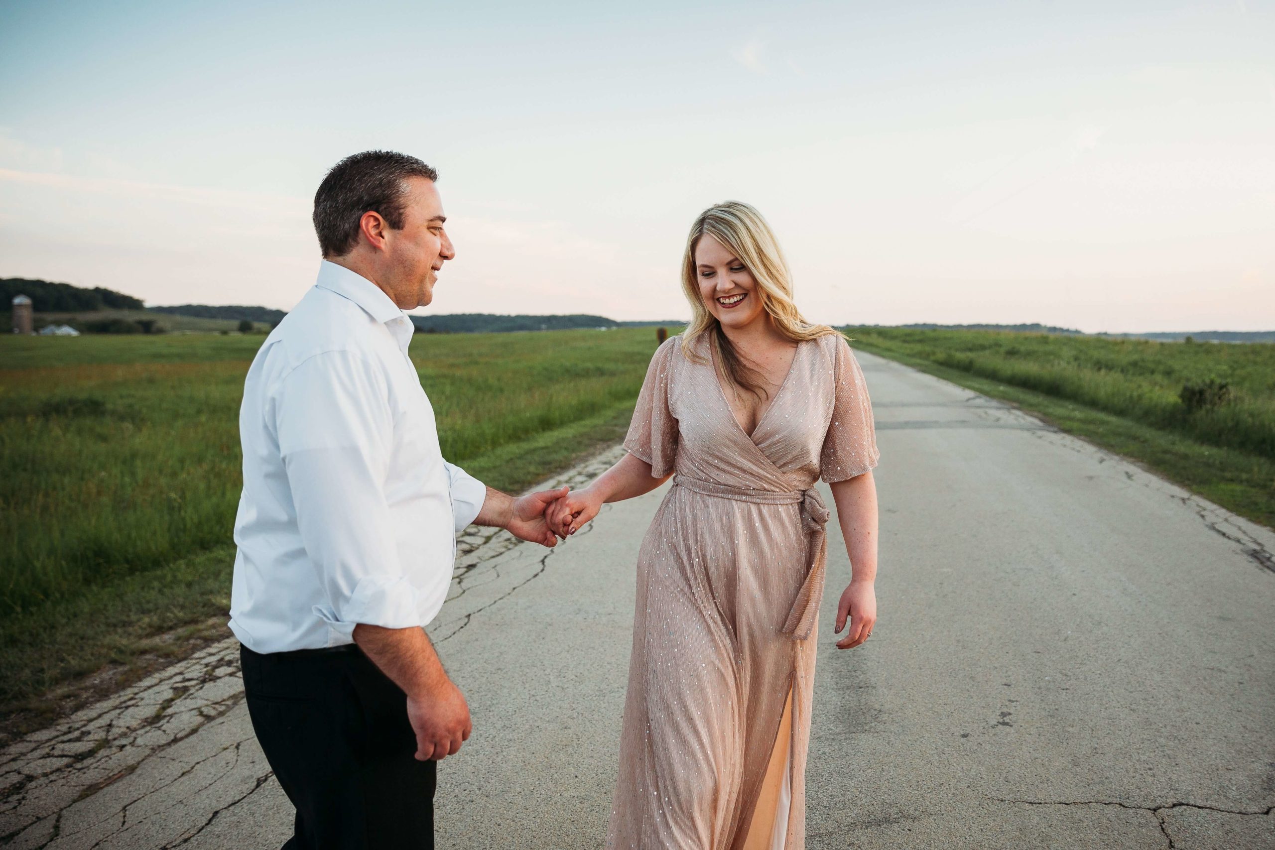 couple walking together during mines of spain engagement session