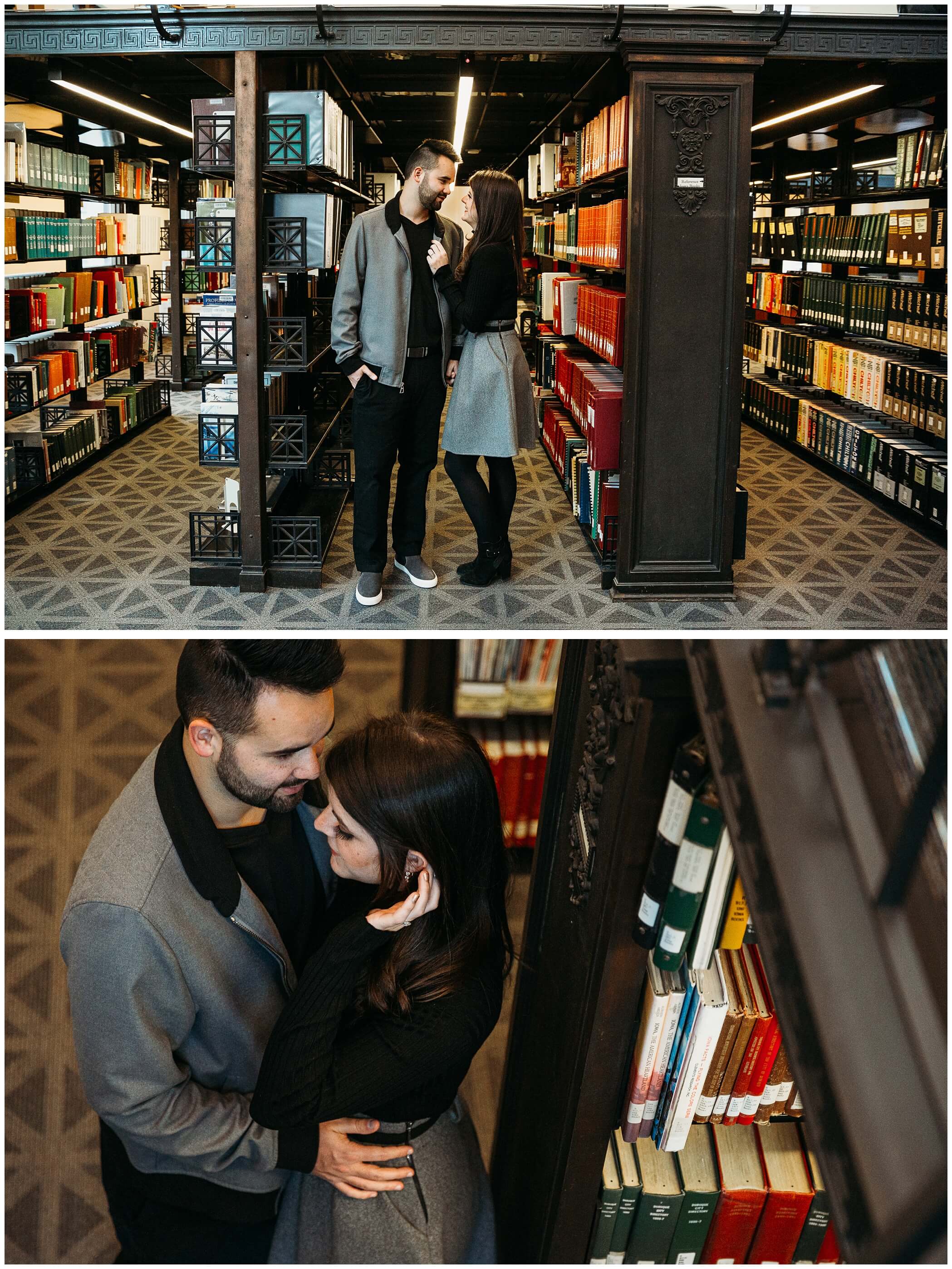 couple standing in between rows of book during their dubuque library engagement session